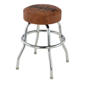 The Taylor Bar Stool is ready to keep you comfortable while you make music. Theclassic design features a comfortable padded swivel seat in a marbled brown matte vinyl finish with a black Taylor logo. At 24" high, the Taylor Bar Stool is easy to assemble and comes with an added foot ring for maximum playing comfort.