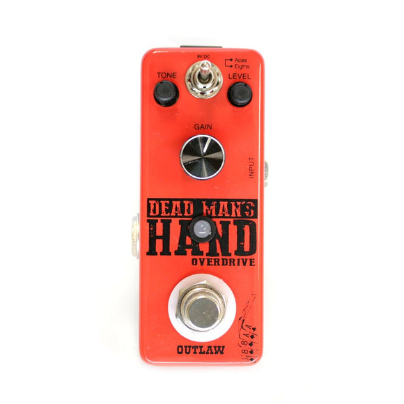 DEAD MAN'S HAND 2-MODE OVERDRIVE    Wide array of gritty, overdriven tones; at home across multiple genres.  Two distinct overdrive modes:  EIGHTS: Smooth, amp-like breakup perfect for rhythm, warm blues styles, etc.  ACES: Hotter, thicker overdrive with added sustain, suitable for soaring lead parts