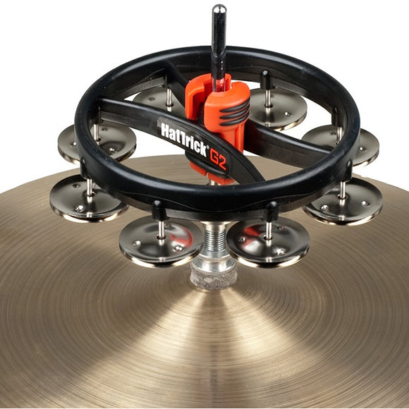 Rhythm Tech pioneered the original and much imitated Hat Trick 15 years ago, a simple Hi-Hat tambourine that gave drummers a way to play tambourine patterns with their hi-hat pedal. Now we offer the Hat Trick G2. A significant step ahead featuring a unique Quick Release Knob that makes it fast and easy to put it on and take off the Hi-Hat pull rod.
