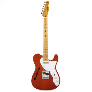 The Classic Vibe ‘60s Telecaster® Thinline is a nod to the early semi-hollow Tele models from the 1960s, creating incredible tone courtesy of the Fender-Designed alnico single-coil pickups. Player-friendly features include a slim, comfortable “C”-shaped neck profile with an easy-playing 9.5”-radius fingerboard and narrow-tall frets, as well as a vintage-style Telecaster bridge with a string-through-body design and individual steel saddles for precise adjustment. 