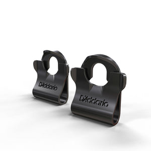 The D'Addario Dual-Lock Strap Lock provides a low-cost alternative to strap security for additional instrument protection. Without need of modification, the Dual-Lock clips onto your existing strap button to prevent your strap from releasing accidentally.