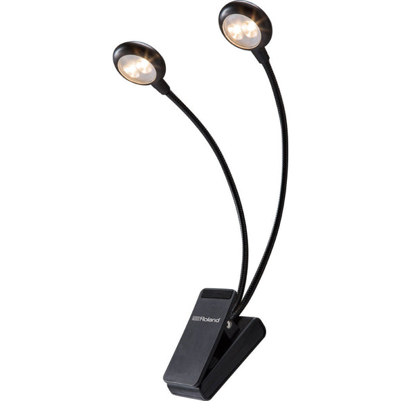 Keep your music and gear illuminated with this handy Roland LCL-15W battery-powered clip light. Dual LED lamps with flexible arms allow you to direct the light right where you need it.