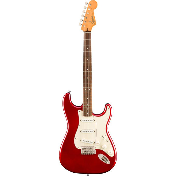 A tribute to the 1960s evolution of the Strat®, the Squier Classic Vibe '60s Stratocaster - Candy Apple Red creates incredible tone courtesy of a trio of Fender-Designed alnico single-coil pickups.